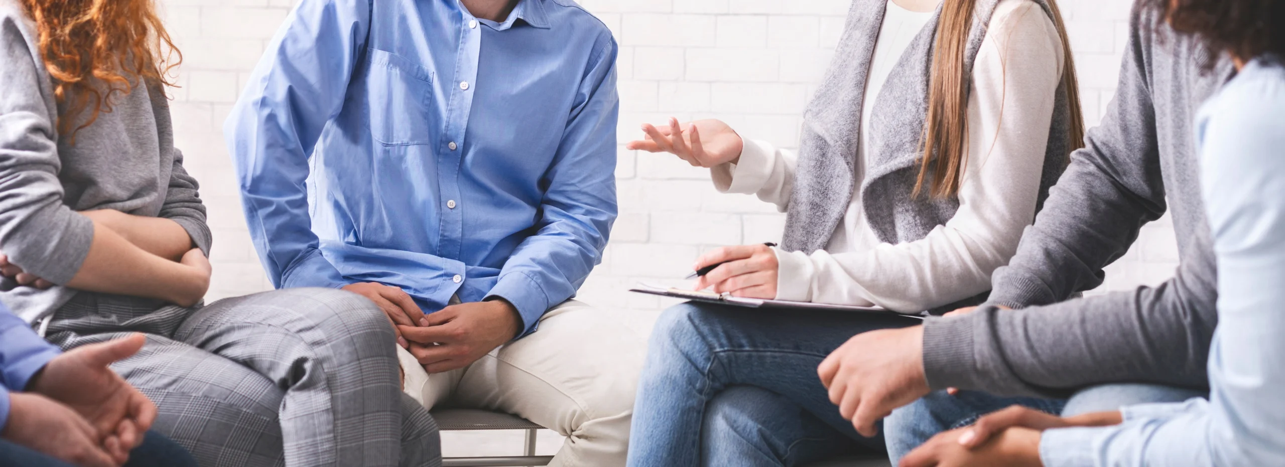 Four people in a business meeting