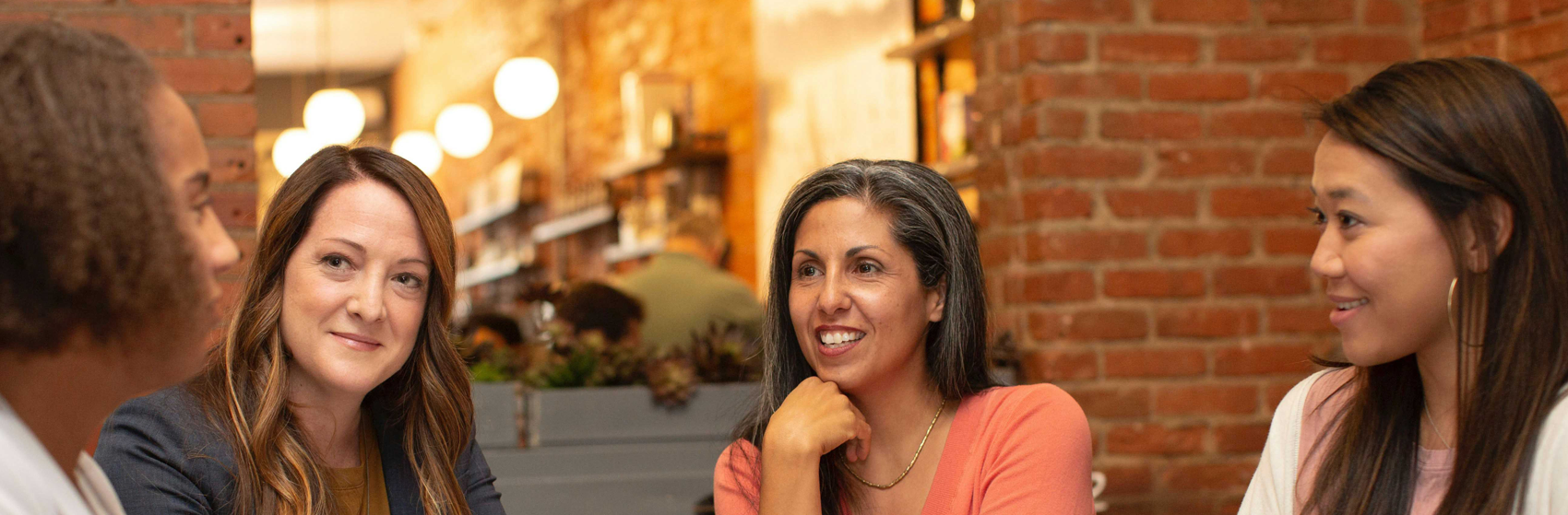 Women in a cafe having a business meeting